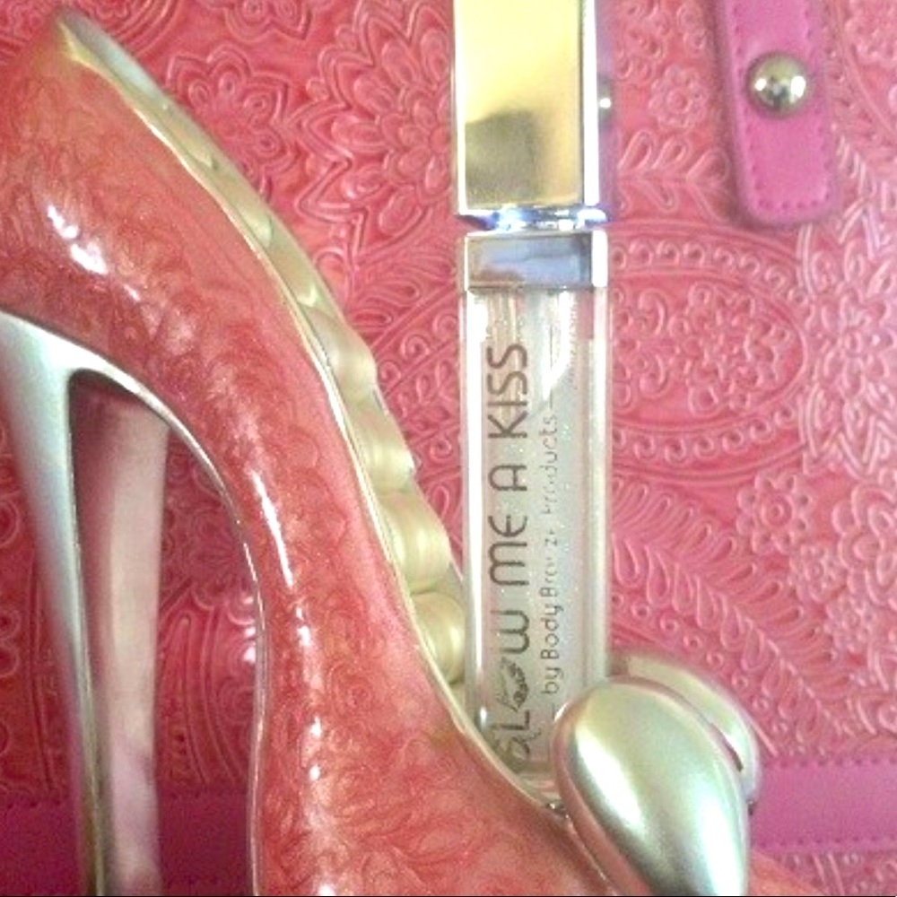 Free Ship Clear Lip Gloss with Light Up Applicator and Mirror on the Side.